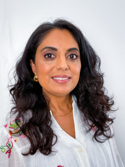 Sunita, the UK primary teacher who makes the Teach My Kids worksheets.